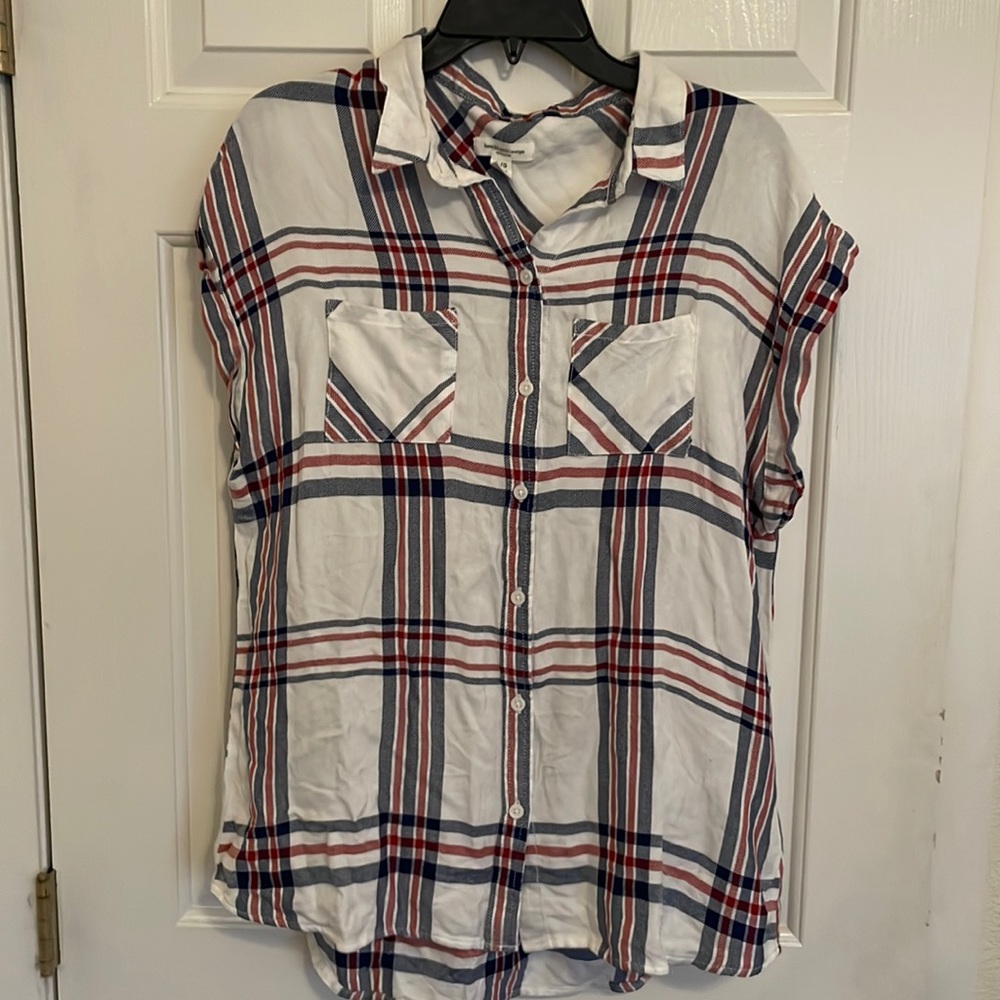 White plaid shirt sleeved shirt